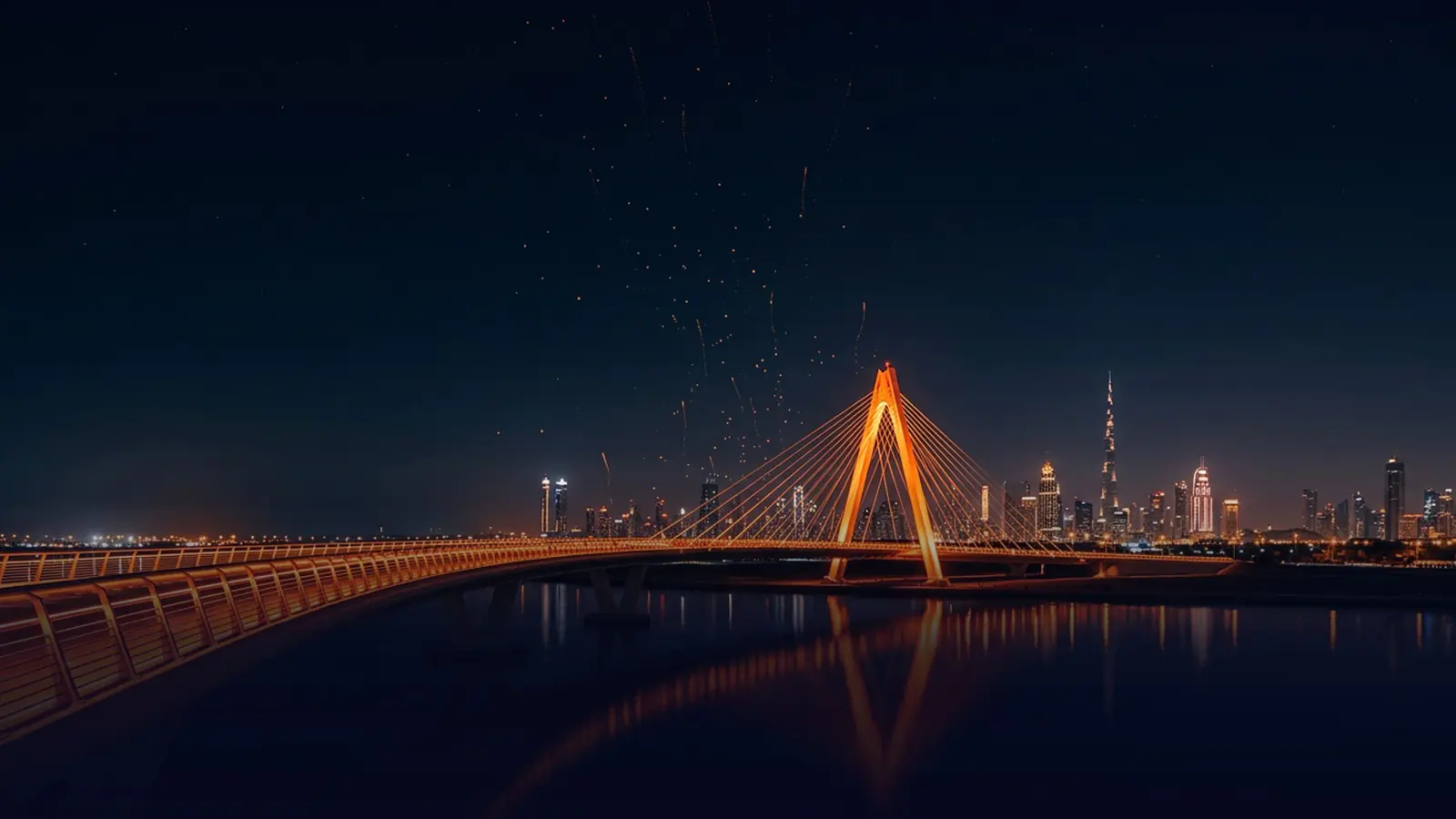 Illuminated bridge at night in the UAE
